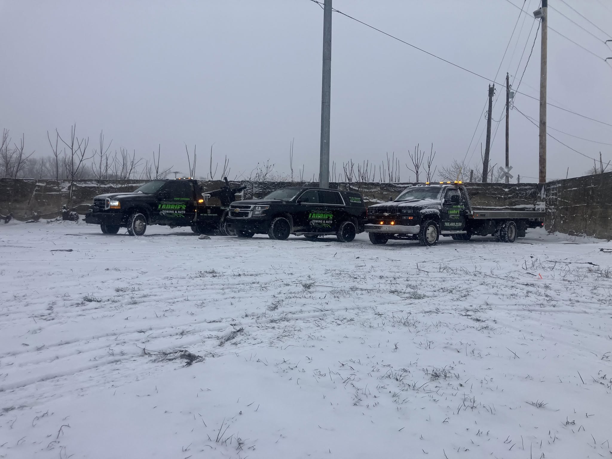 Laurie’s Towing and Auto fleet ready in snowy weather.